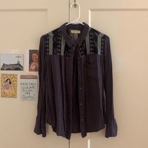 Purple collared shirt with shoulder design